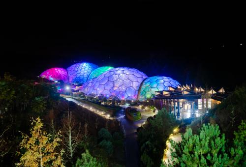 Eden's Biomes lit up with colourful lights.